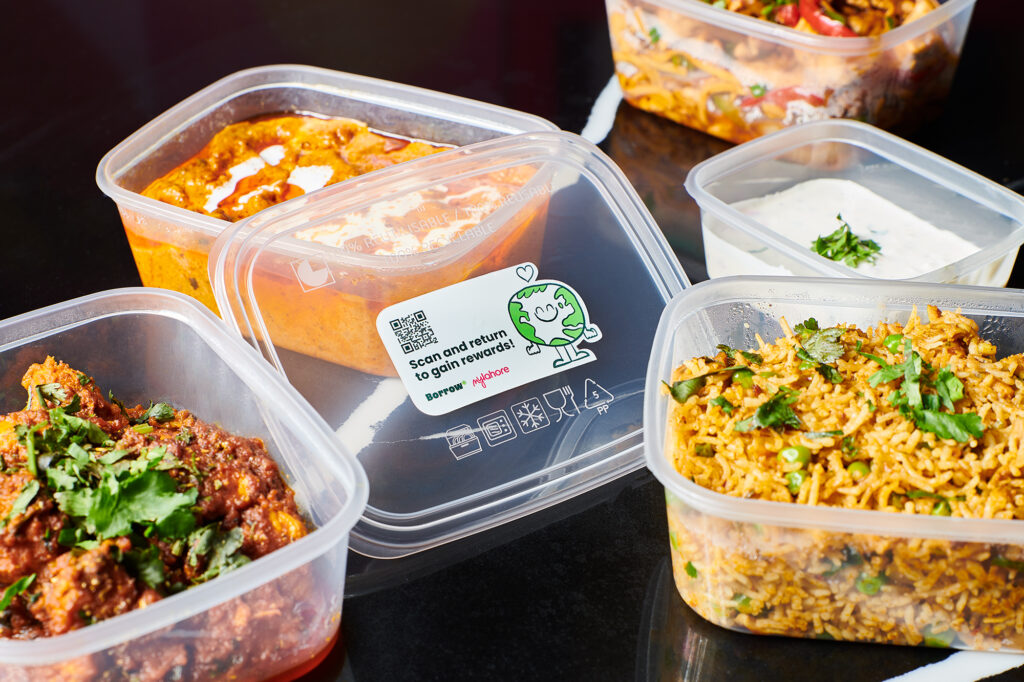 Food containers with the MyLahore and Borrow Logos